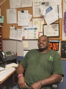 Dennis H. proudly wears his BAC shirt.